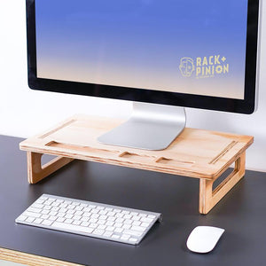 Wooden Monitor Stand on a desk with a monitor on it